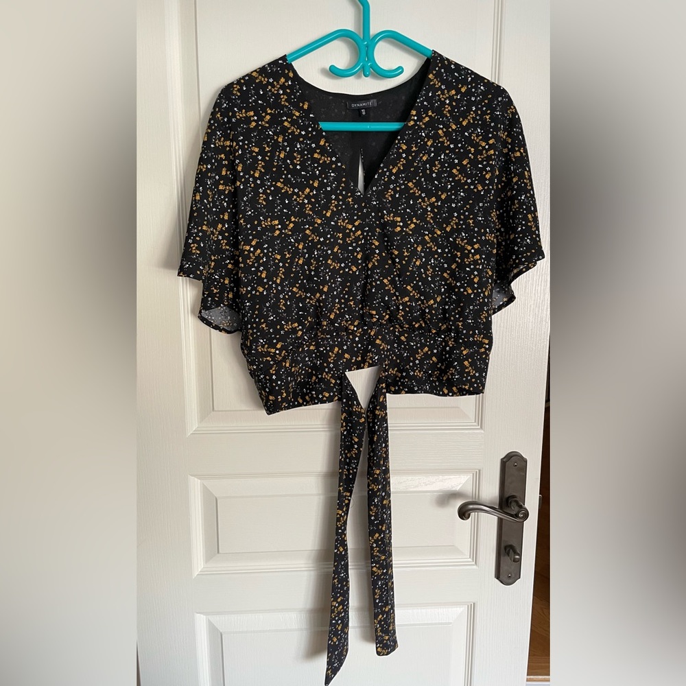 Dynamite top with tie back detail